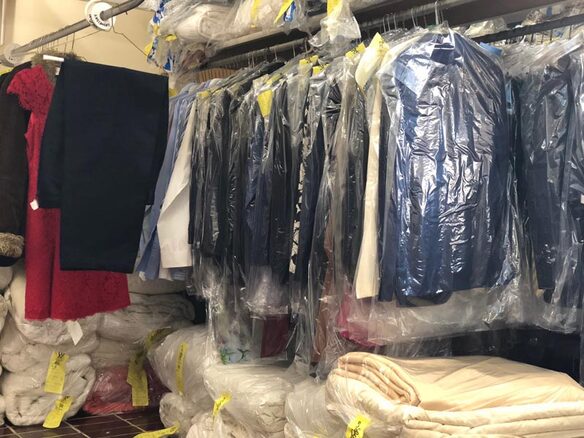 A full rack of assorted garments dry cleaned by Canberra's expert dry cleaners R&R Fabricare